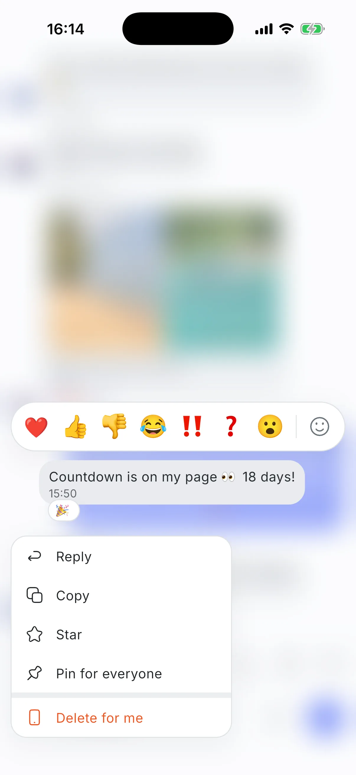 Holding a message: the page softens, and reactions and the message’s actions appear around it